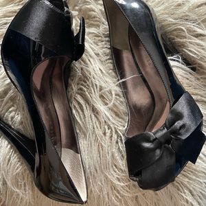 Paris Hilton black patent leather shoes